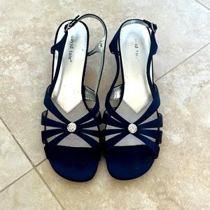 Navy blue, satin sling back sandals. Size 12. Heel height 3 inches. Worn.